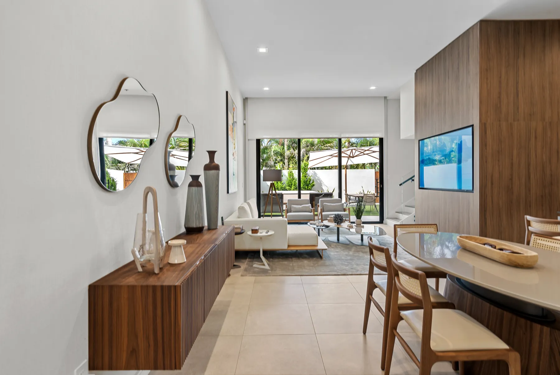 Dining and living room opening to the backyard