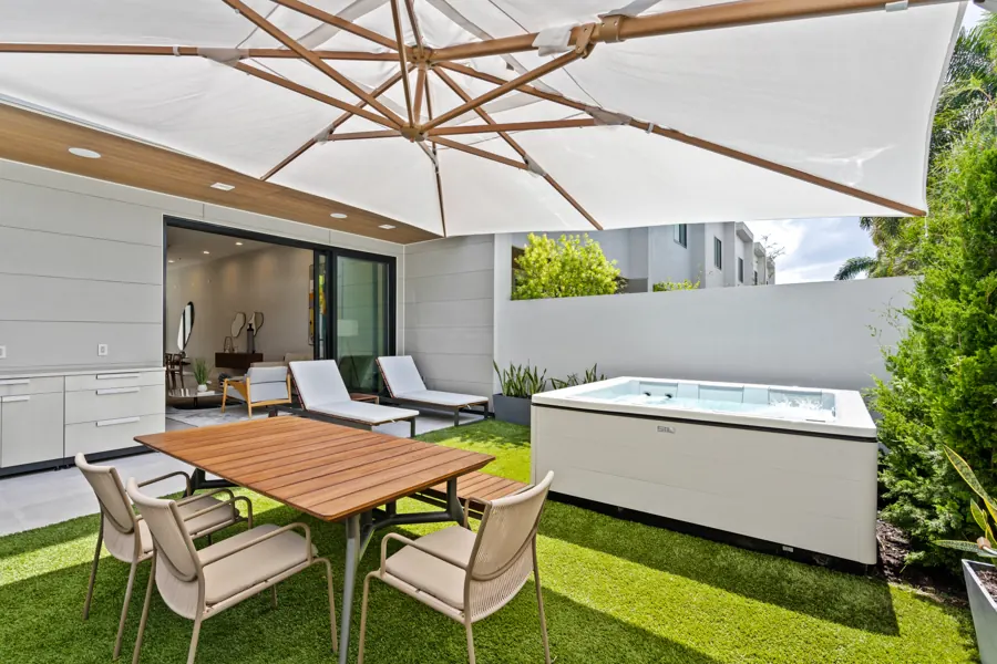 Backyard dining under the umbrella